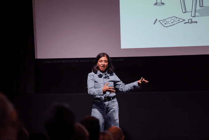 Ariba Jahan speaking on stage